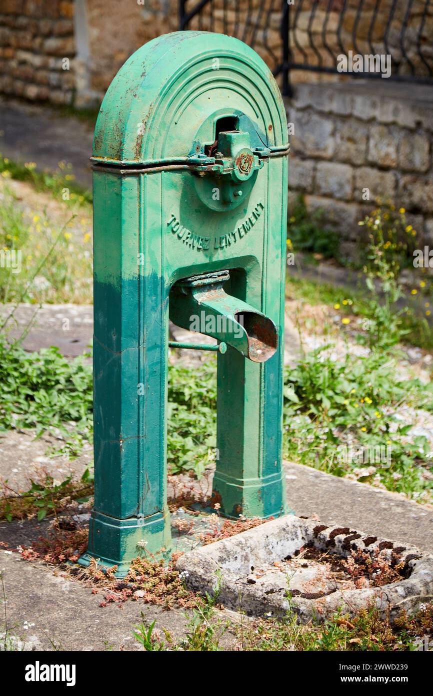 Dry Green Public Water Spigot Stock Photo