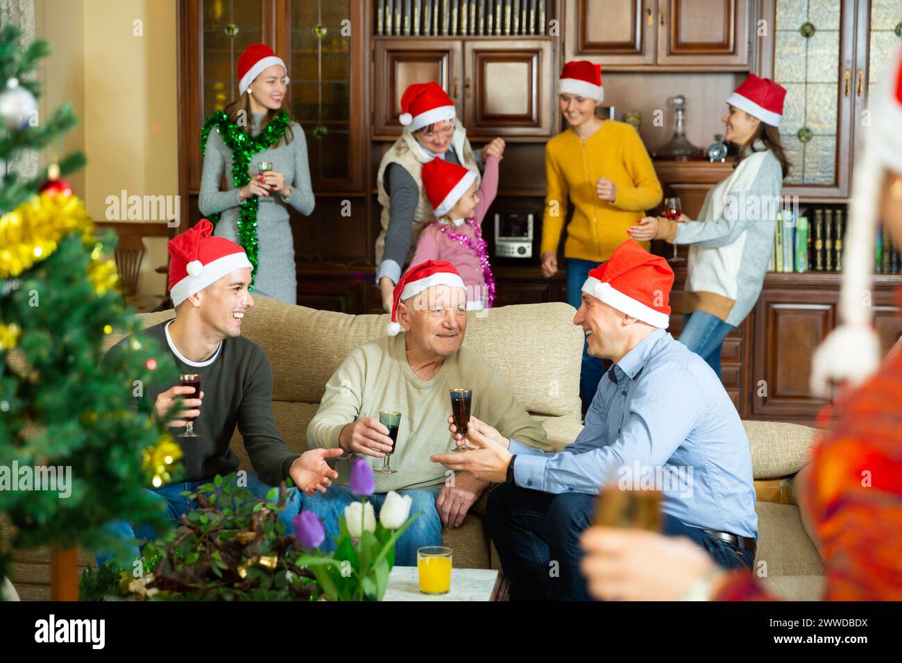 Family spending time together on Christmas night Stock Photo