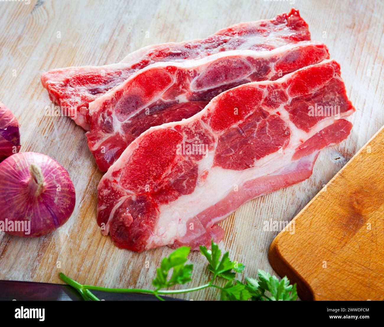 Uncuttable Meat Butcher chopping raw meat knife hi-res stock photography and images - Alamy