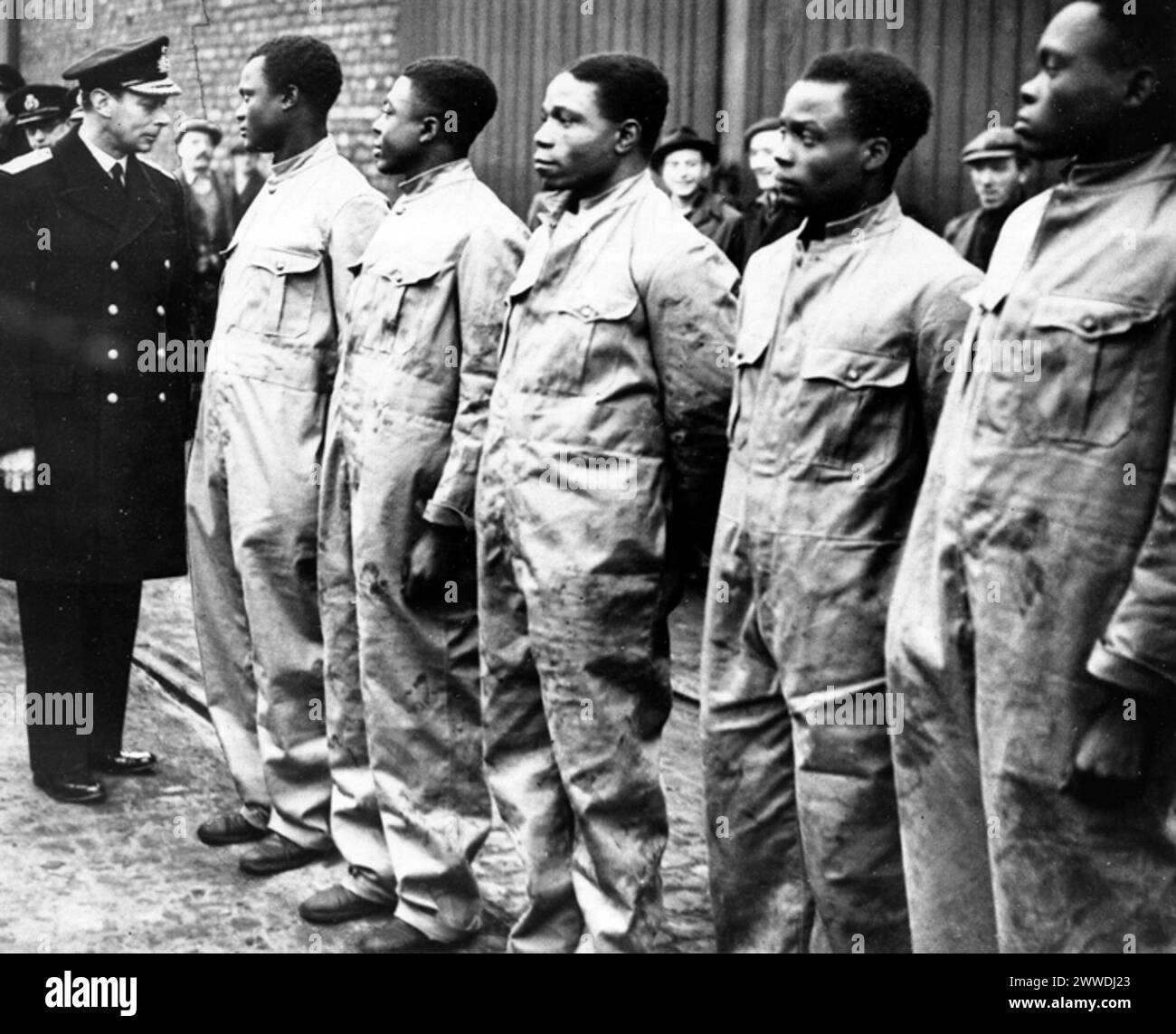 Photograph of King George VI inspecting workers on the British home ...