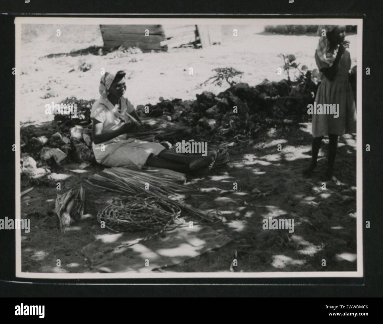 Thatch rope manufacturing in East End, Grand Cayman, 1953-1954, showing ...