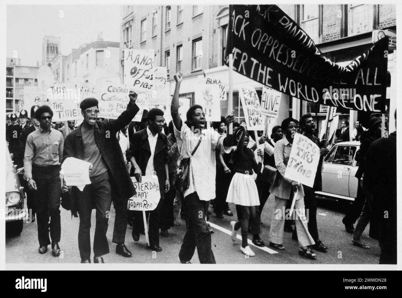 Mangrove Nine protest 1970 Document: Photo from the Mangrove Nine protest, 1970 (MEPO 31/21) Description: On 9 August 1970, a group of activists led 150 people on a march against police harassment of the Black community in Notting Hill, London. They called for the ‘end of the persecution of the Mangrove Restaurant’. Between January 1969 and July 1970, the police had raided the Mangrove Restaurant twelves times. No evidence of illegal activity was found during these raids. Nine men and women were put on trial at the Old Bailey for causing a riot at the march. These men and women became known na Stock Photo