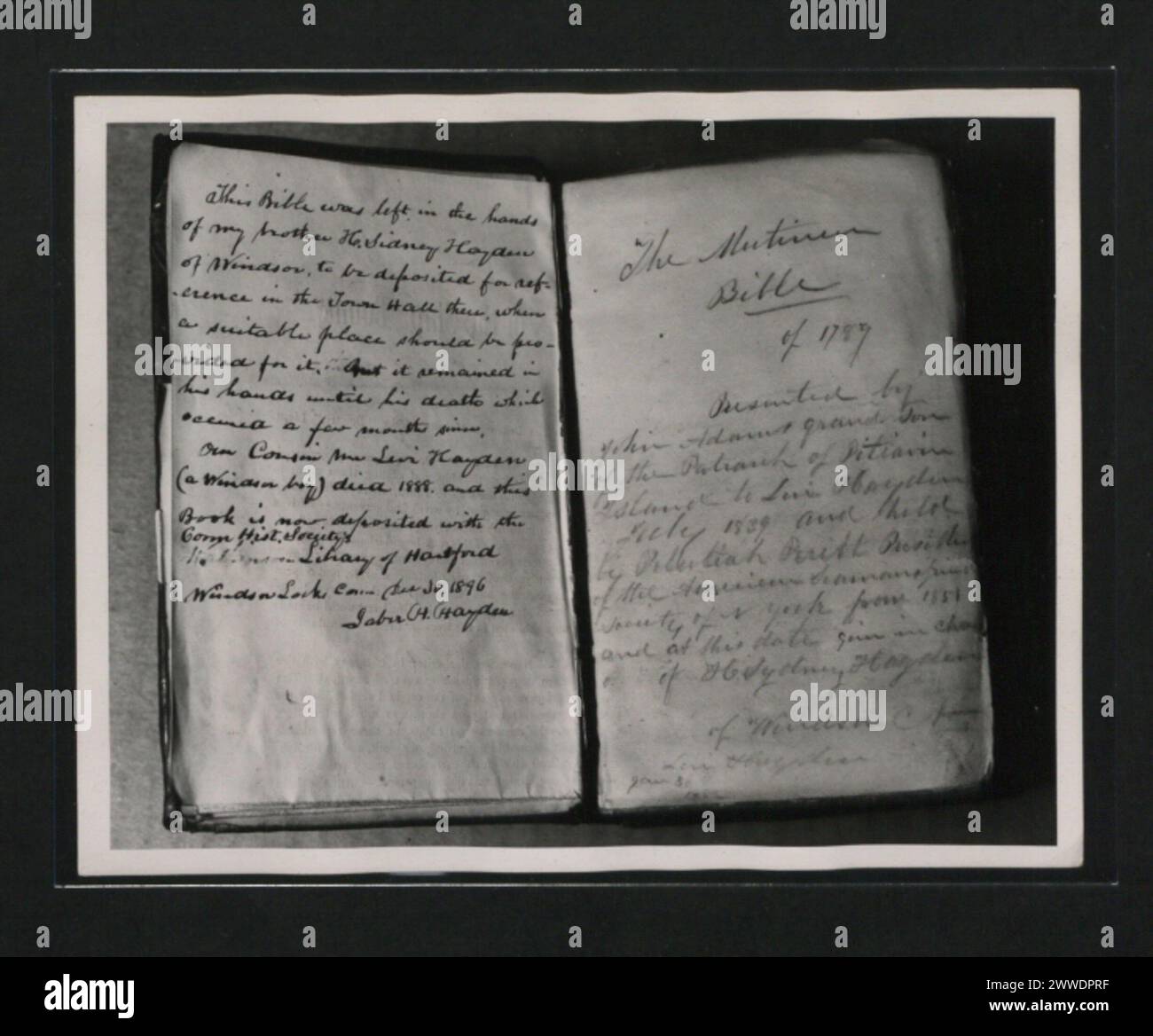 Description: The opening page of the Bible, with the original handwriting of Levi Hayden, to whom the Bible was given by a grandson of John Adams. Location: Pitcairn Islands Stock Photo