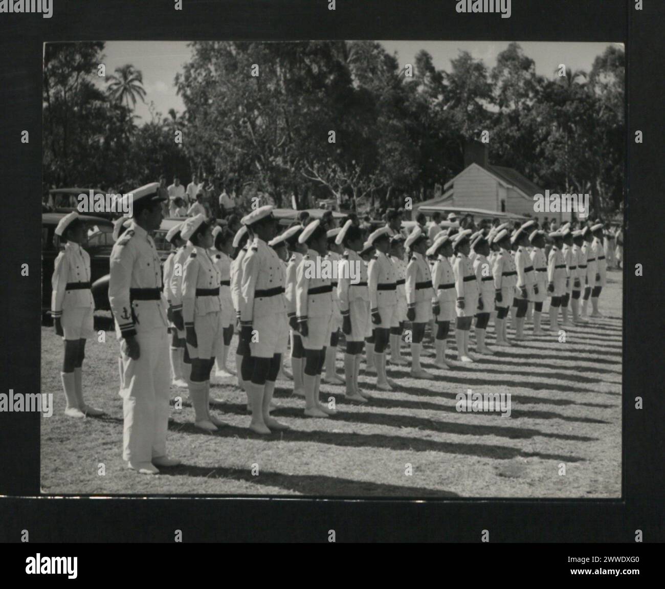 Photograph showing school cadets in Tonga forming a line along the ...
