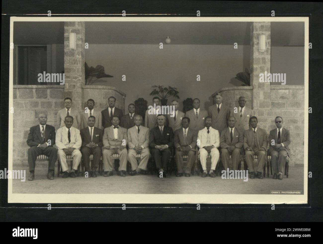 Description: Members of the Governor-General's Advisory Council photographed at Governor-General's House during the meeting in January, 1958. Standing (left to right): Sir Archibal Cuke (Barbados), Hon. B. Benn (British Guiana), Hon. R.G. Mapp (Barbados), Mr. E.L. Allen (Jamaica), Mr. J.S. Moerdecai (Federal Secretary), Mr. C. Wylie (Federal Attorney General), Hon. F.A. Glasspole (Jamaica), Mr. L.N. Blache-Fraser (Federal Financial Secretary), Hon. W.J. Alexander (Trinidad). Sitting (left to right): Hon. V.C. Bird (Antigua), Hon. Sir Grantley Adams (Barbados), Hon. F.A. Baron (Dominica), Hon. Stock Photo