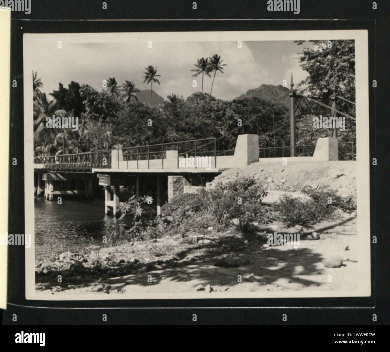 Description: The newly constructed bridge over the Indian River, Portsmouth. Location: Portsmouth, Dominica Date: 1965-1969 caribbean, dominica, caribbeanthroughalens Stock Photo