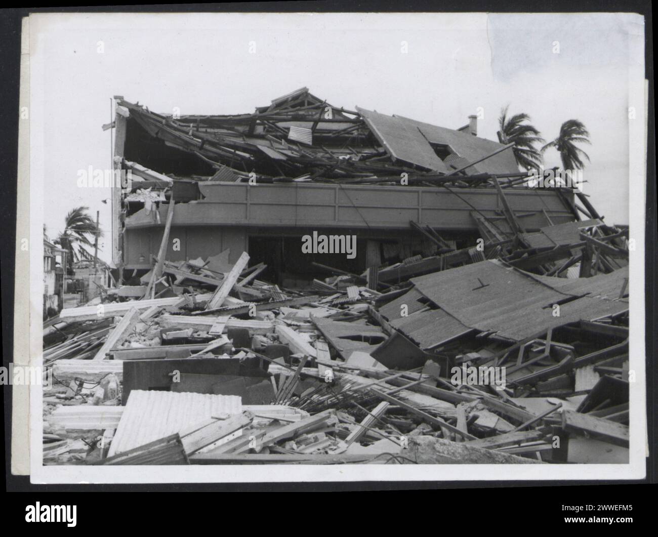 Description: Bardados. [Devastation caused by Hurricane Janet to a theatre in Worthing, Barbados]. Photograph No K 19874 Official Barbados photograph compiled by Central Office of Information. Publicity statement on reverse. Location: Barbados Date: 1955 Sept 22 barbados, caribbean, caribbeanthroughalens Stock Photo