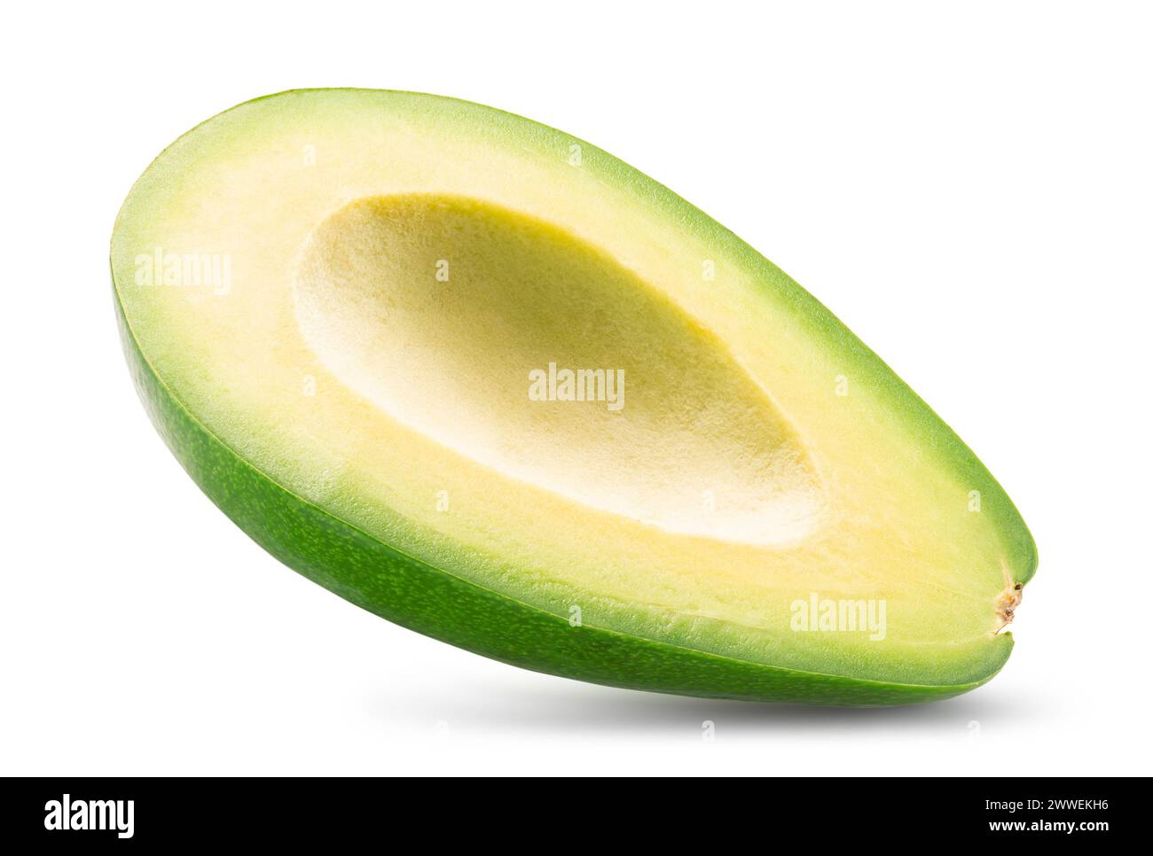 half of tasty avocado isolated on the white background. Clipping path. Stock Photo
