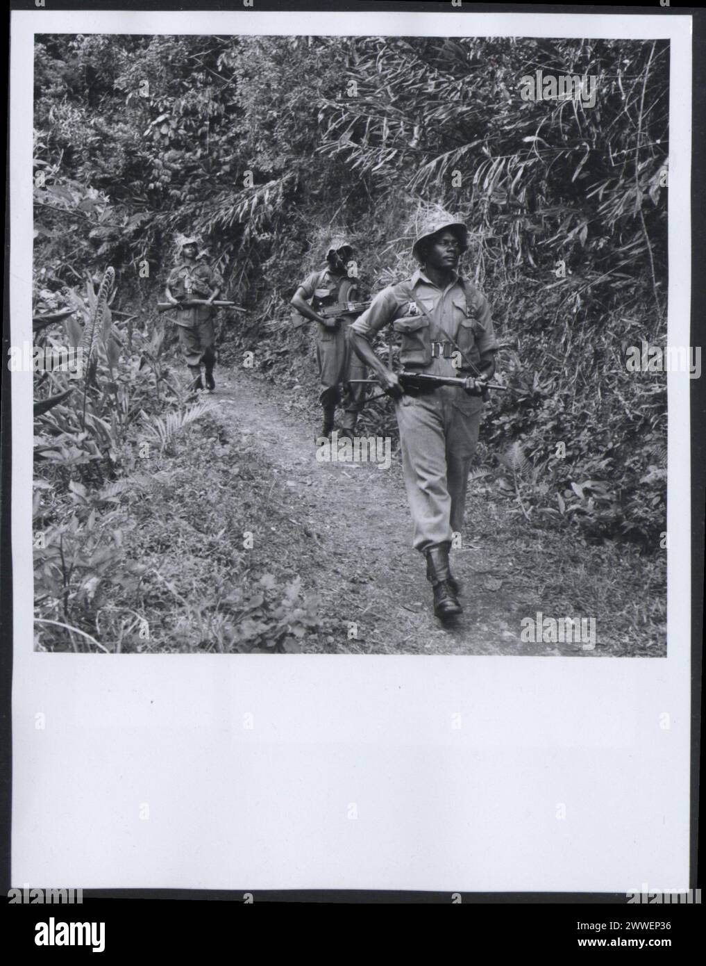 Description: Jamaica. Jamaica regiment. A patrol in the mountain area surrounding Newcastle Hill Station. Photograph No D 78932 issued by Central Office of Information, London. Location: Jamaica Date: 1955 March jamaica, caribbean, caribbeanthroughalens Stock Photo