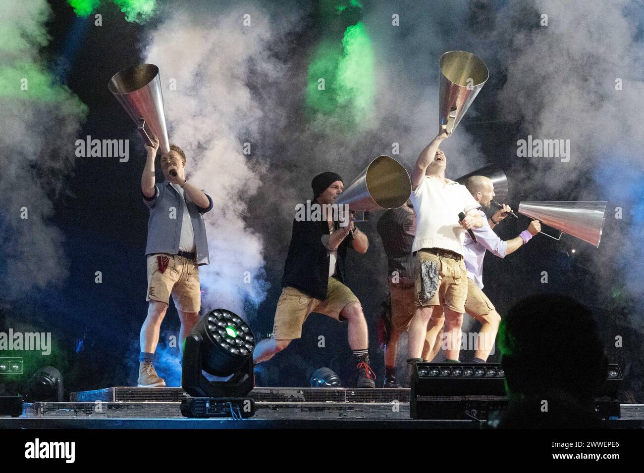 Riesa, Germany. 23rd Mar, 2024. The band voXXclub sings a lederhosen ...