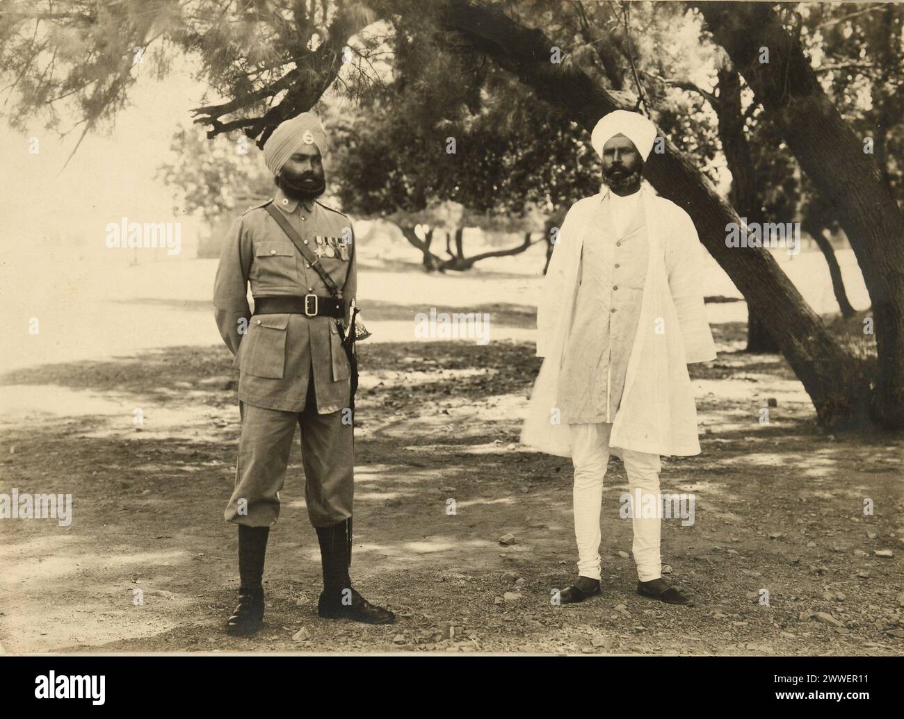 Sikh Indian officers Description: Sikh Indian officers in uniform and mufti Location: North west frontier of India Date: 1933-1935 military Stock Photo