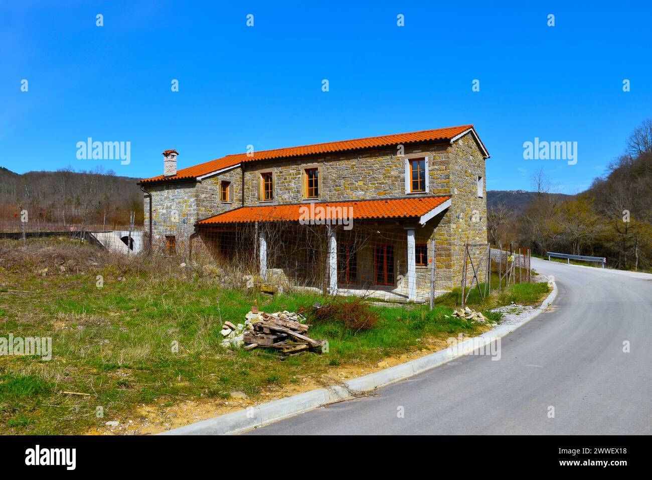 House next paved road hi-res stock photography and images - Alamy