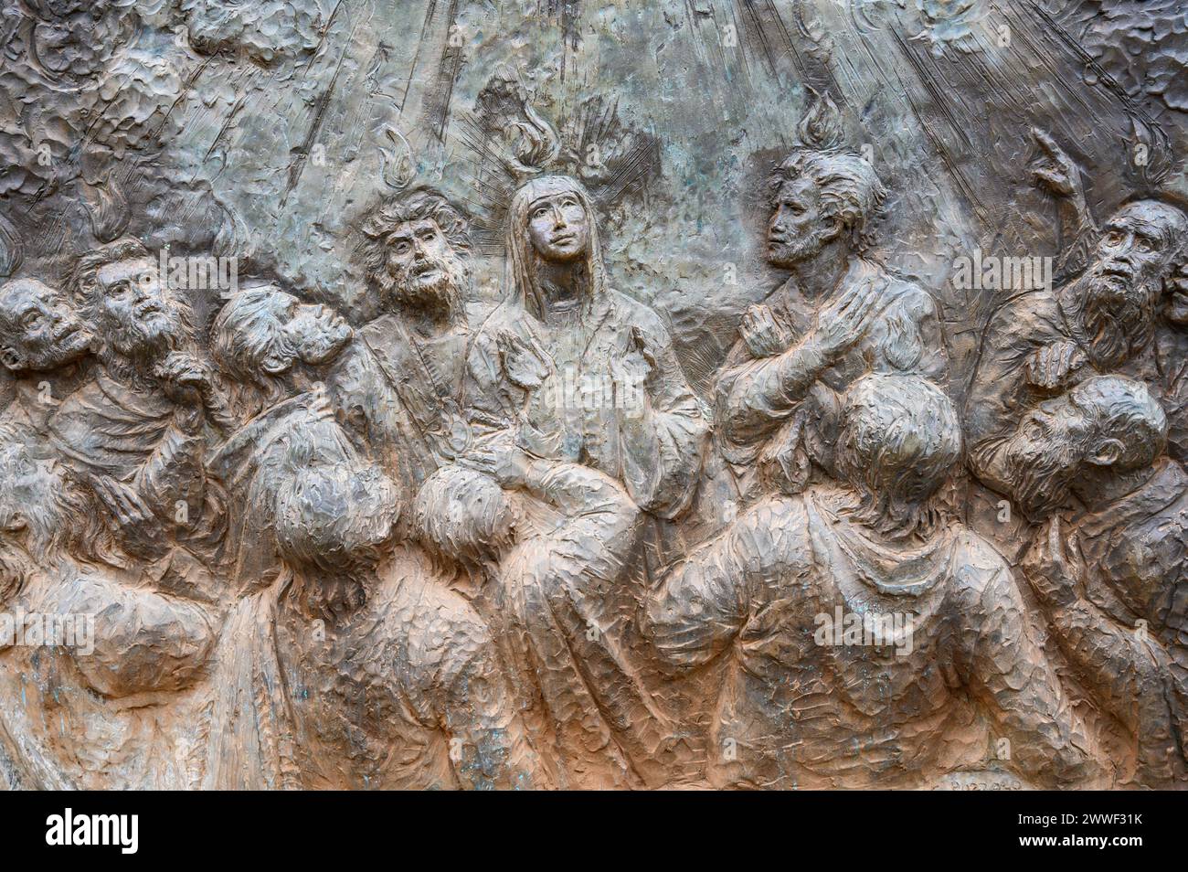 The Descent of the Holy Spirit – Third Glorious Mystery of the Rosary. A relief sculpture on Mount Podbrdo (the Hill of Apparitions) in Medjugorje. Stock Photo