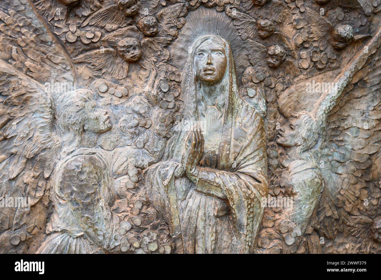 The Assumption of Mary – Fourth Glorious Mystery of the Rosary. A relief sculpture on Mount Podbrdo (the Hill of Apparitions) in Medjugorje. Stock Photo