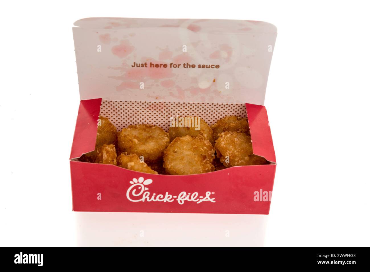 Winneconne, WI - 23 March 2024: A package of  Chick Fil A hash brown on an isolated background. Stock Photo