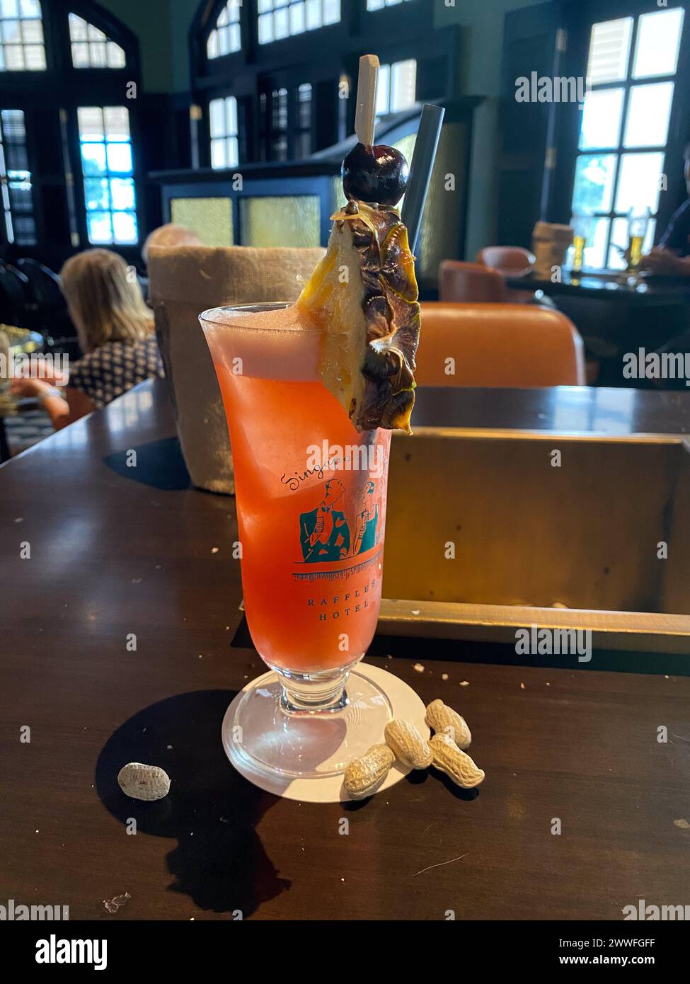 Singapore Sling in the Long Bar of Raffles Stock Photo