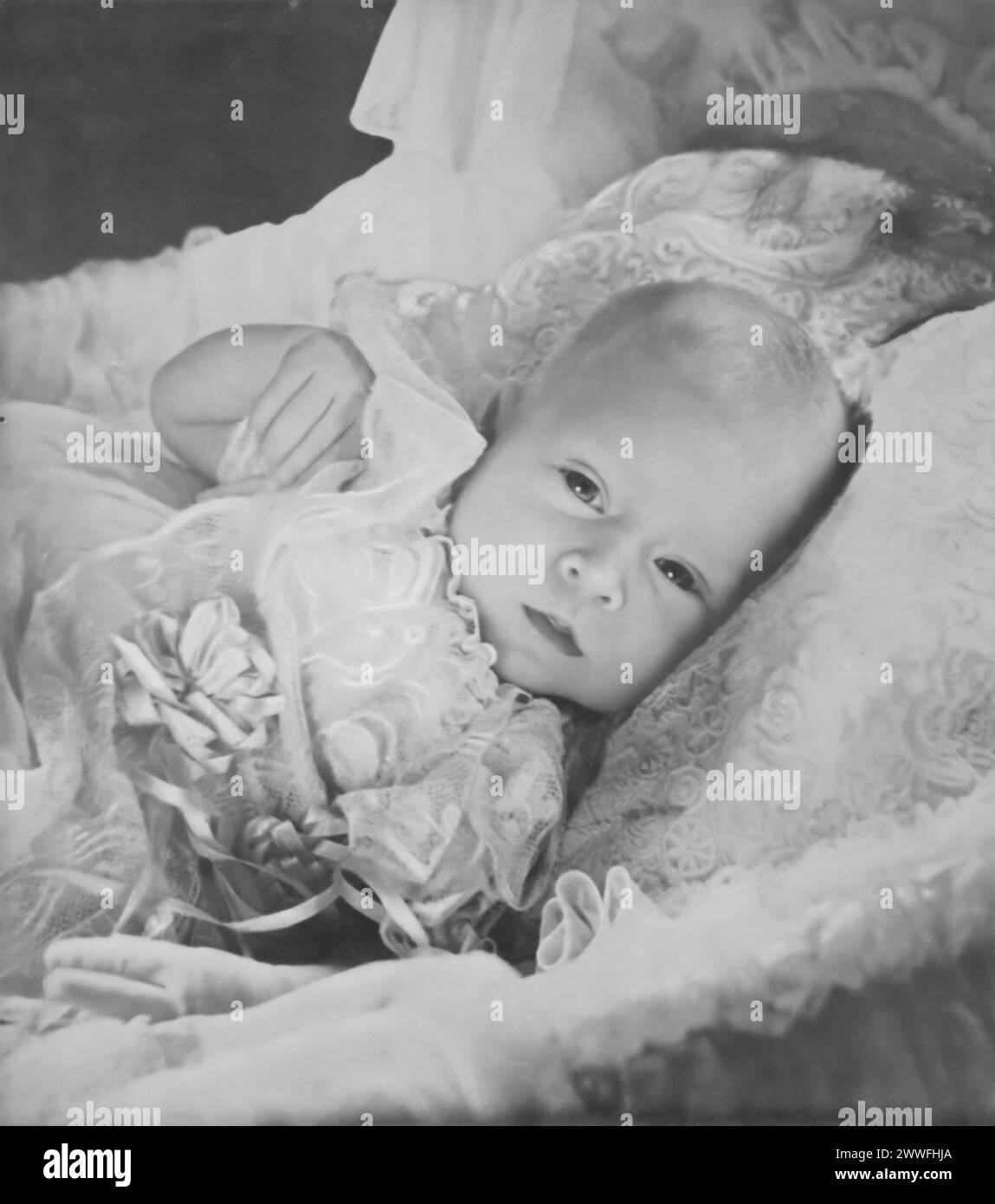A photograph shows the newly born Prince Charles III laying in his cot.Taken in November 1949, this image marks the arrival of a significant figure in the British royal lineage. Stock Photo