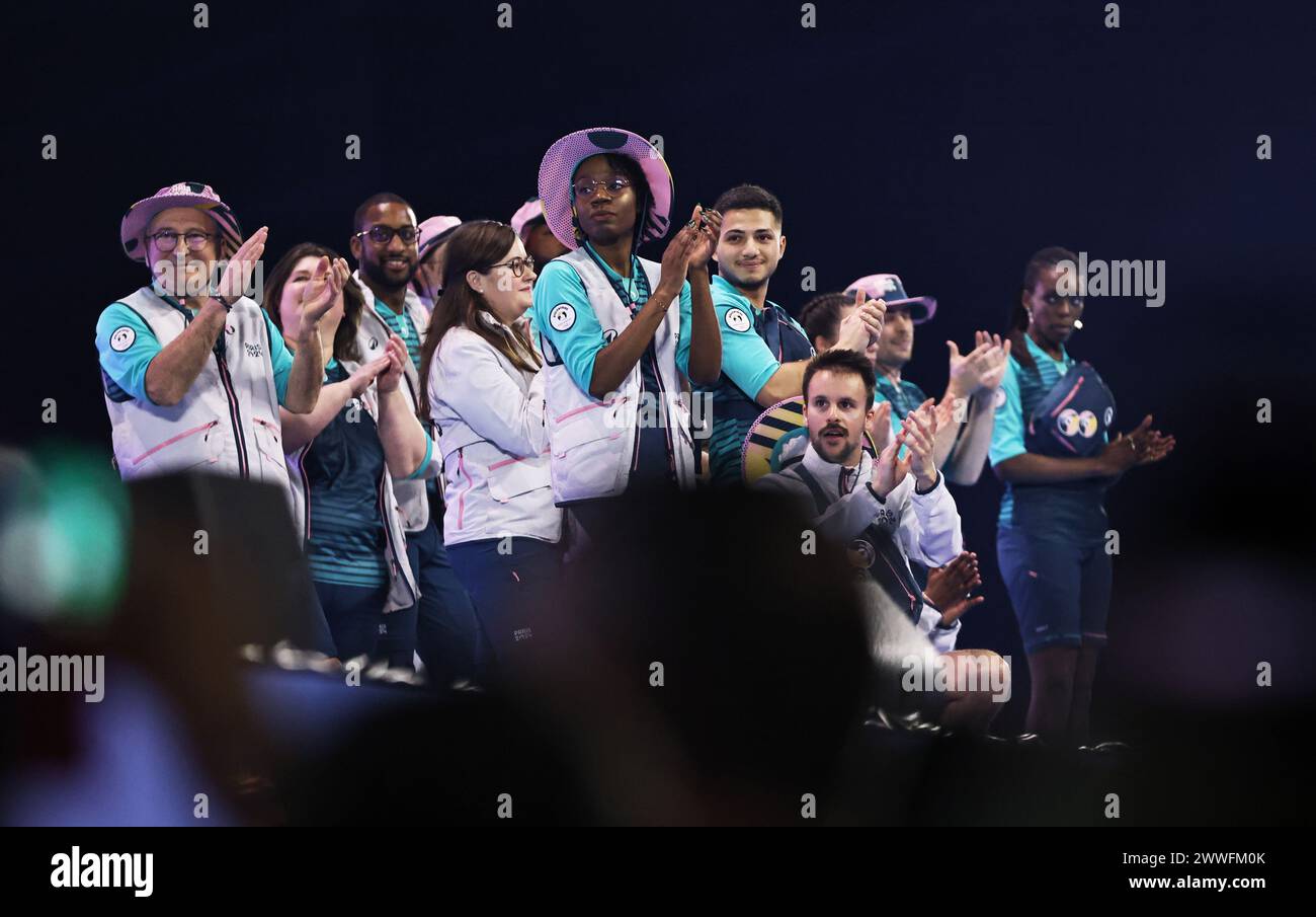 Nanterre, France. 23rd Mar, 2024. Performers present the outfits for