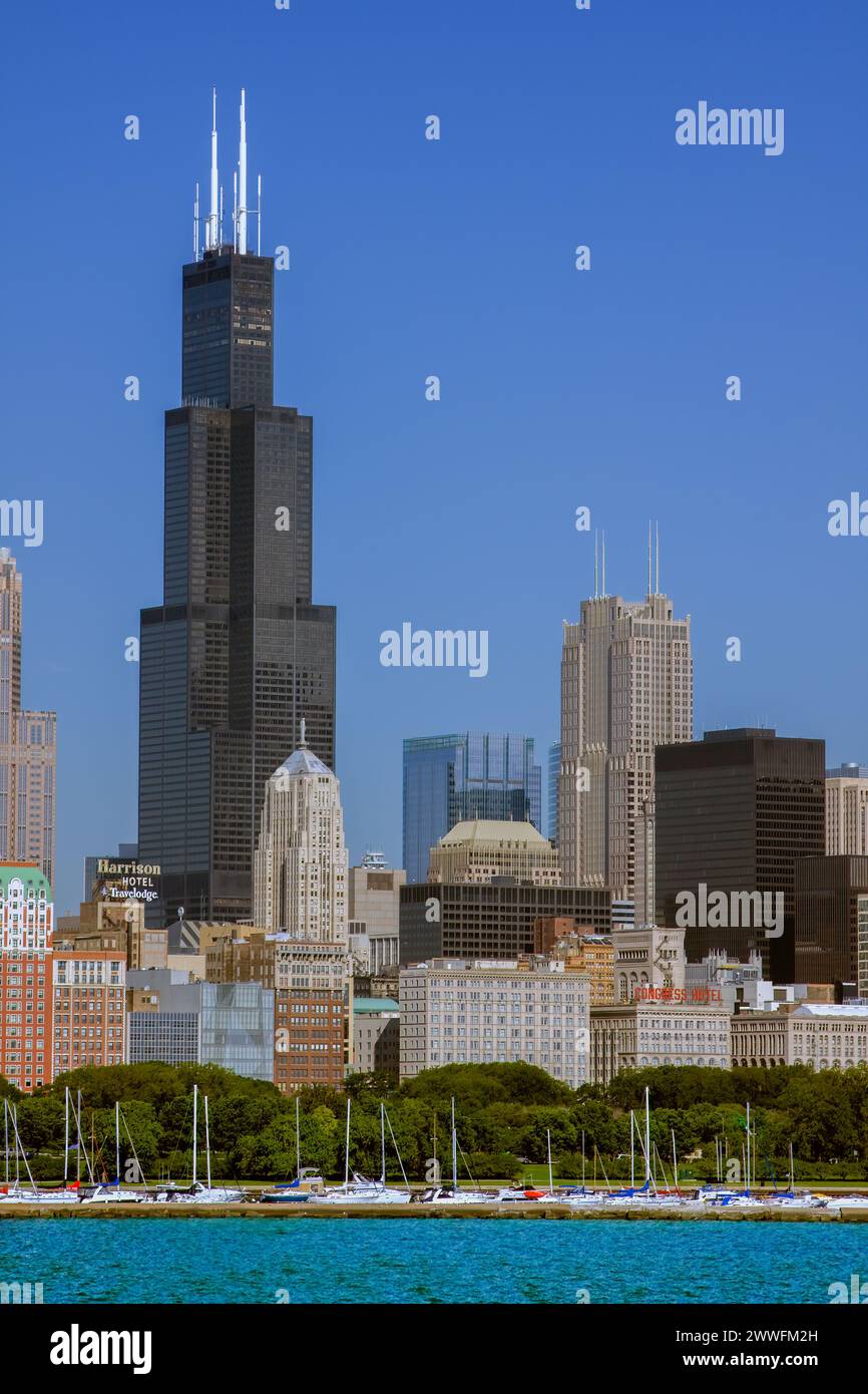 Chicago, Illinois.  Willis Tower (formerly Sears Tower) Dwarfs Chicago Board of Trade Building.  Chicago skyline. Stock Photo