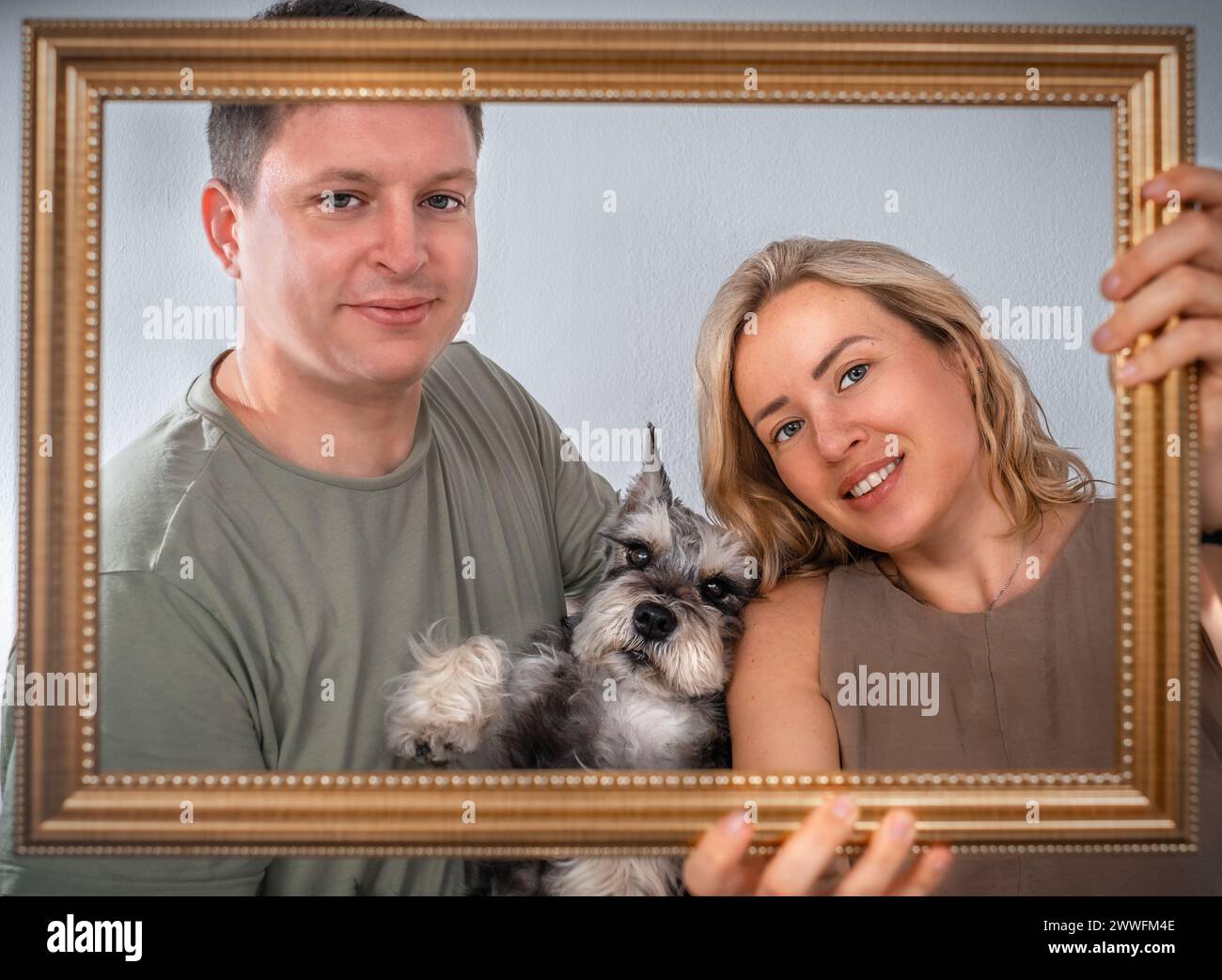 Positive family couple dog hi-res stock photography and images - Alamy