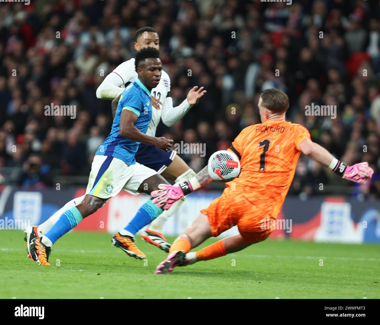 London, UK. 23rd Mar, 2024. Vinicius Junior(Real Madrid)of Braziland Jordan Pickford(Everton)of England in action during International Friendly soccer match between England and Brazil at Wembley stadium, London, UK - 23rd March 2024. Credit: Action Foto Sport/Alamy Live News Stock Photo