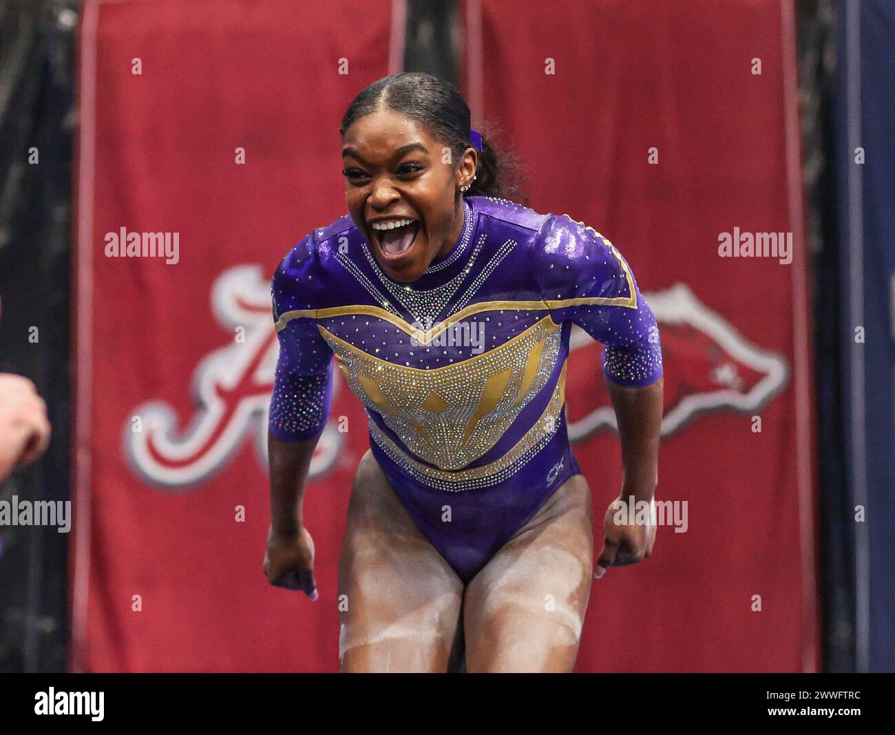 March 23, 2024 LSU's Kiya Johnson celebrates after her balance beam
