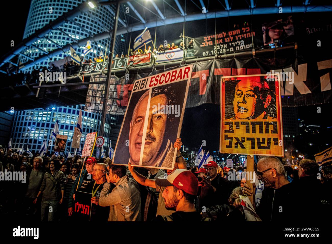 Tel Aviv, Israel. 23rd Mar, 2024. Israeli protestors wave anti Prime Minister Benjamin Netanyahu placards during a demonstration. On Saturday, thousands of Israelis held protests across Israel against the current government led by Prime Minister Benjamin Netanyahu and demanded a hostage deal with Hamas. Credit: SOPA Images Limited/Alamy Live News Stock Photo