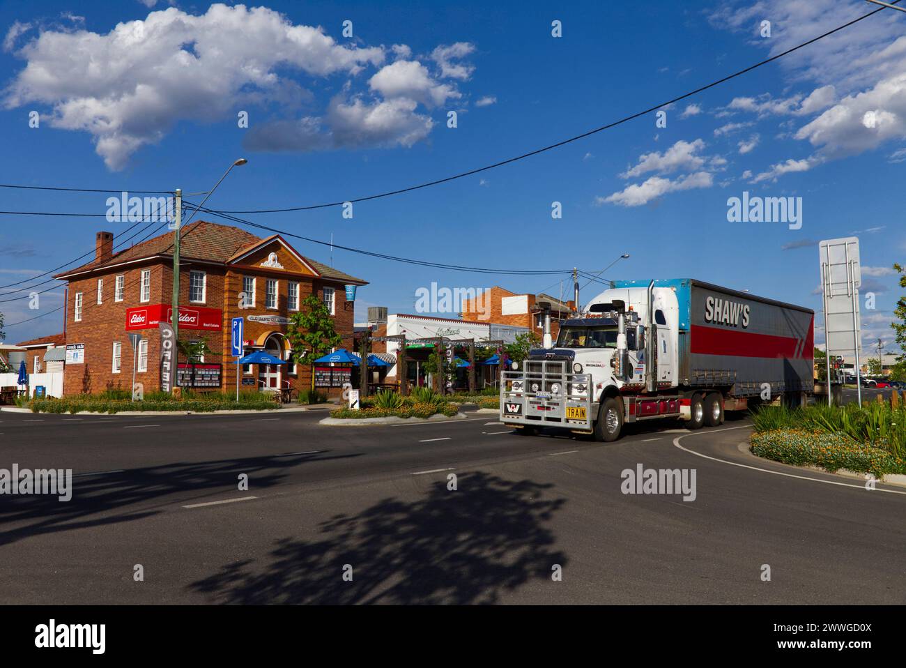 Heavy truck passing along the Leichhardt Highway on the Darling Downs at Miles Queensland Australia Stock Photo