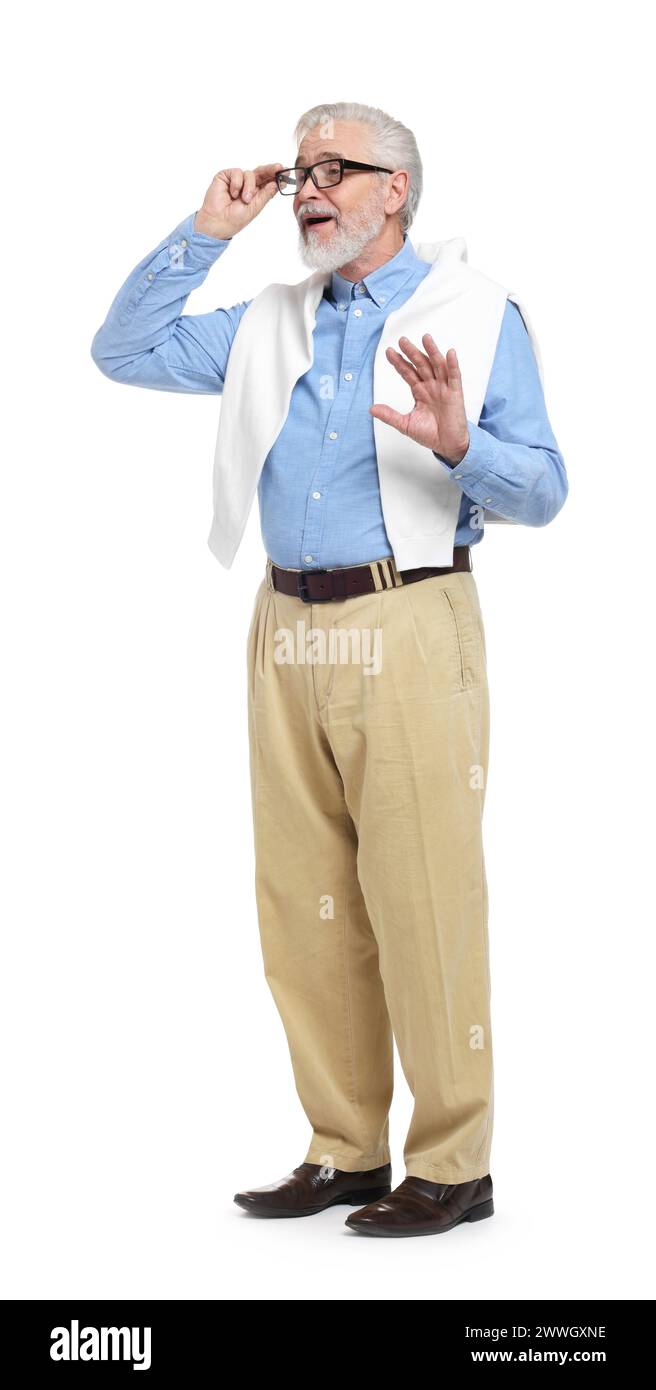 Senior man waving hand on white background Stock Photo