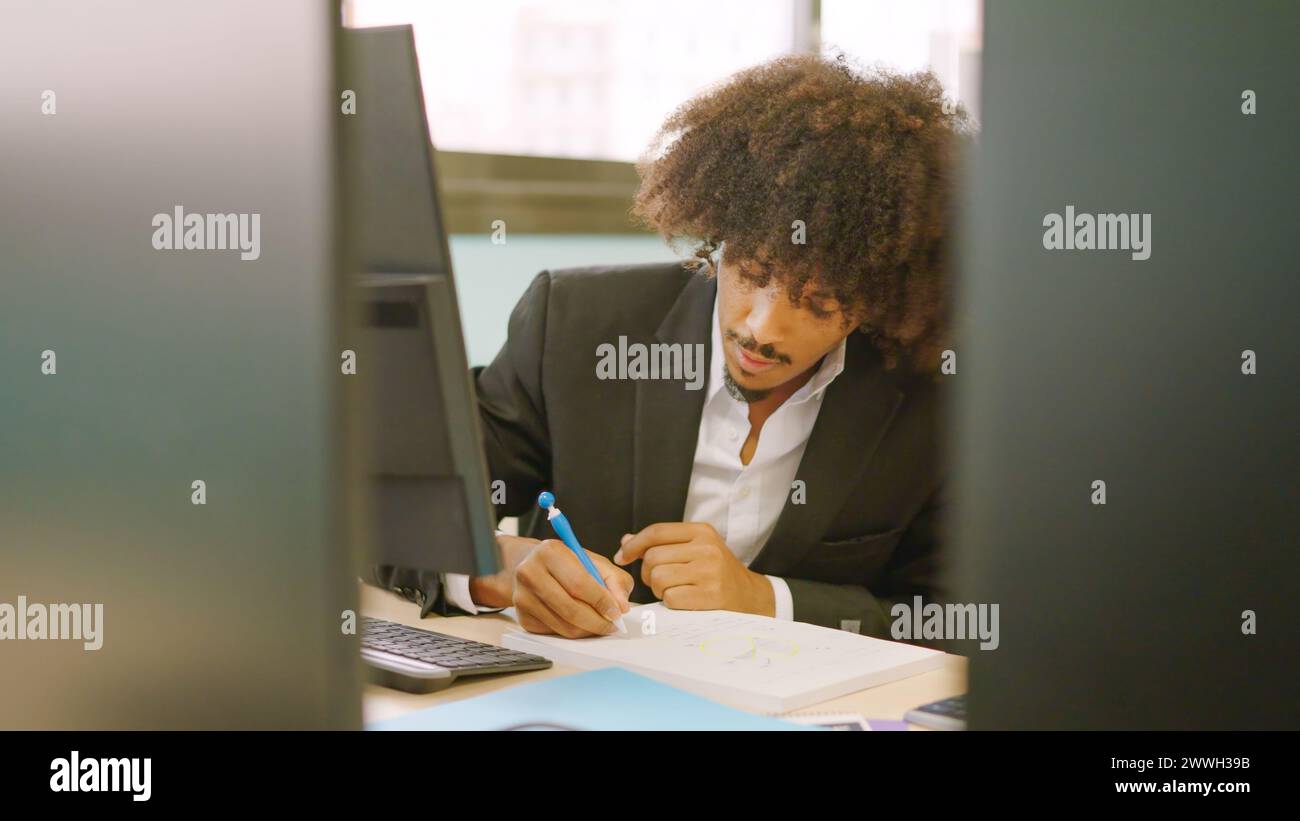 African american man working in a coworking Stock Photo