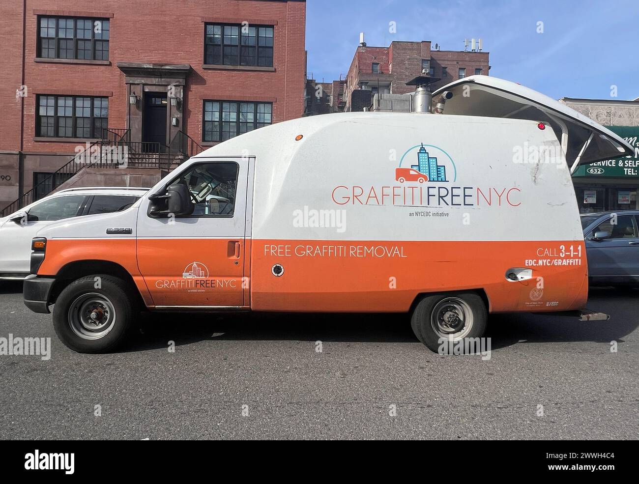 Graffiti Free NYC Van. Graffiti is a constant problem in many cities in the USA. Graffiti removal service van in Brooklyn, New York City. Stock Photo