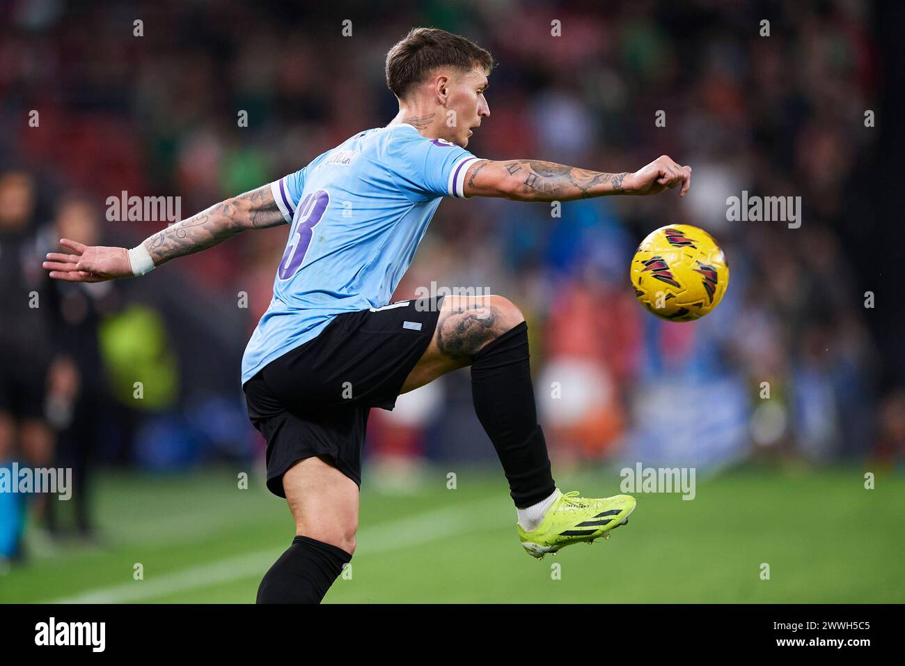 Bilbao, Spain. 23 March, 2024. Guillermo Varela of Uruguay with the ball during the Friendly Match Pais Vasco v Uruguay at Estadio de San Mames on March 23, 2024 in Bilbao, Spain. Credit: Cesar Ortiz Gonzalez/Alamy Live News Stock Photo