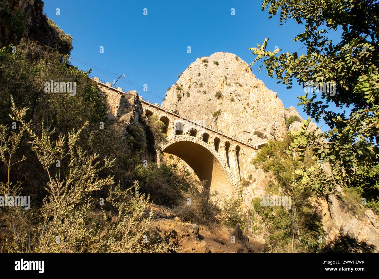 Spectacular stone railway bridge in the village of El Chorro, at the ...