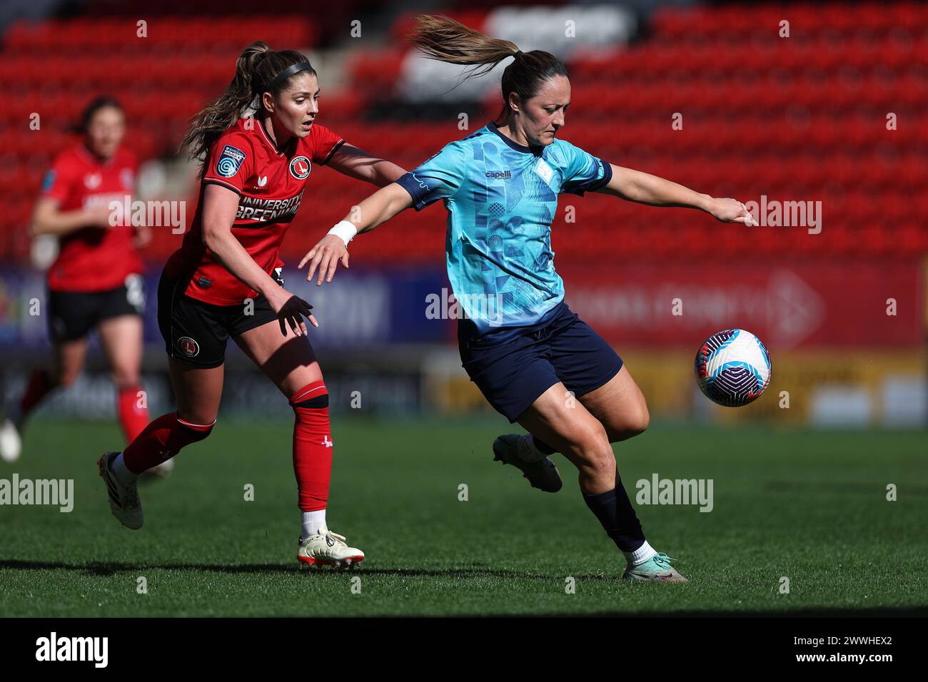 Greenwich, UK. 24th Mar, 2024. Greenwich, London, 24 March 2024: Carla Humphrey (8 Charlton Athletic) and Megan Campbell (6 London City Lionesses) battle for possession during the Barclays Womens Championship football match between Charlton Athletic and London City Lionesses at The Valley in London, England. (James Whitehead/SPP) Credit: SPP Sport Press Photo. /Alamy Live News Stock Photo
