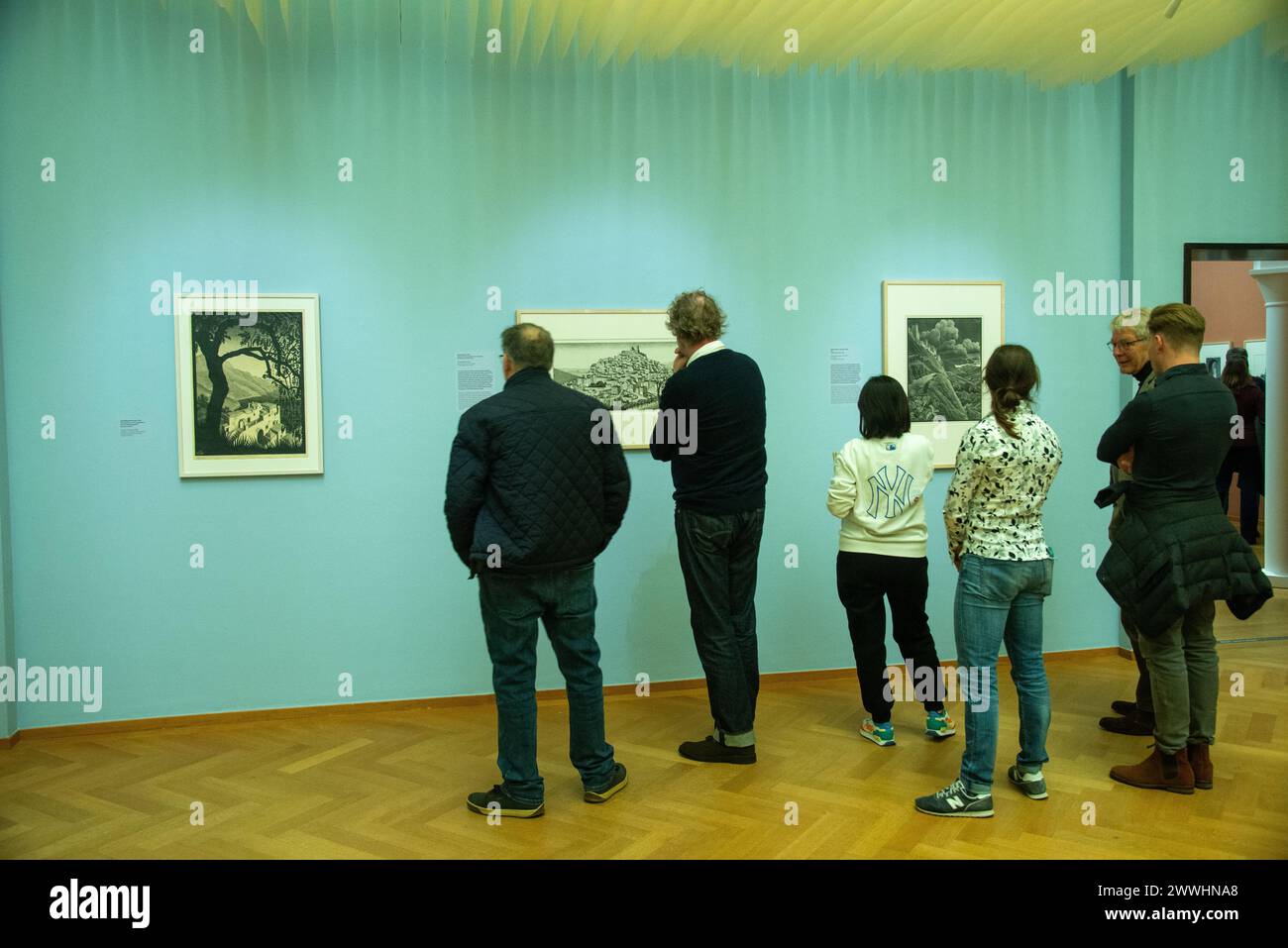 visitors at exhibition by dutch artist Escher Stock Photo