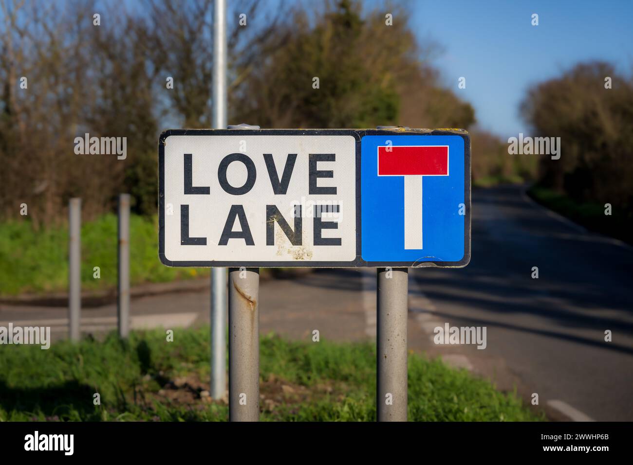 Love is a dead-end street - Sign: Love lane and a dead end street Stock Photo