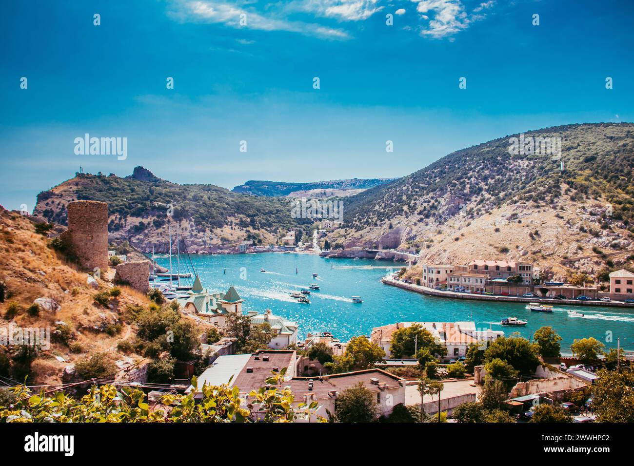 Balaklava bay in summer in sunny weather. Crimea, Russia. A lot of boats and ships. Bay for boats. Balaklava bay in summer in sunny weather. Crimea, R Stock Photo