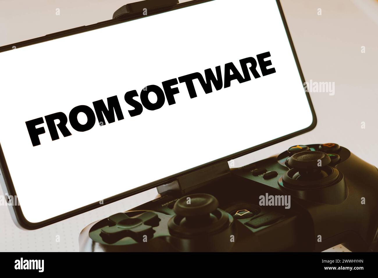 November 11, 2023, Brazil. In this photo illustration, the FromSoftware logo is displayed on a smartphone screen, next t November 11, 2023, Brazil. In Stock Photo