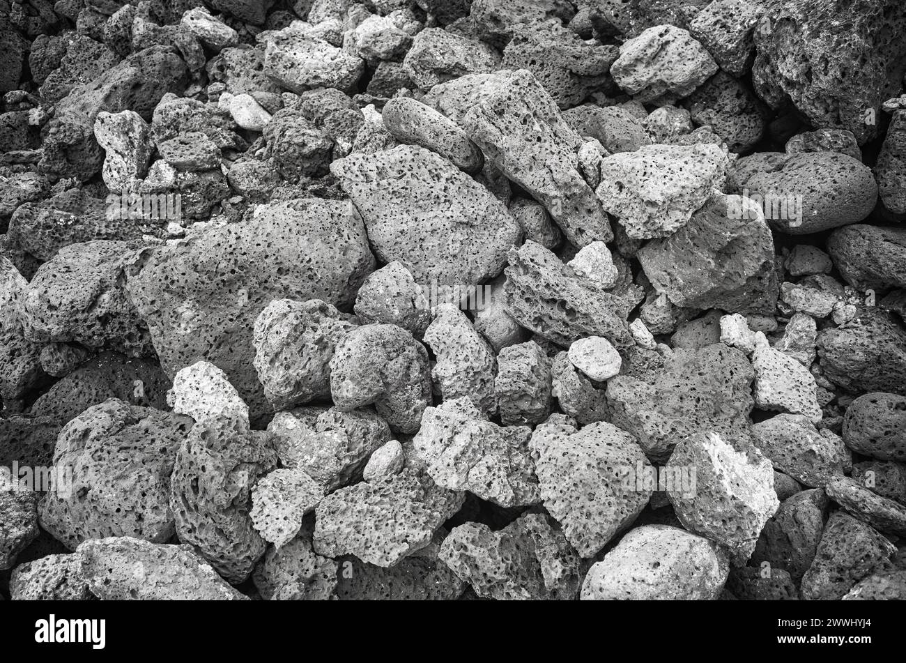 Black and white close up photo of pumice stones, nature background, Galapagos Islands, Ecuador. Stock Photo