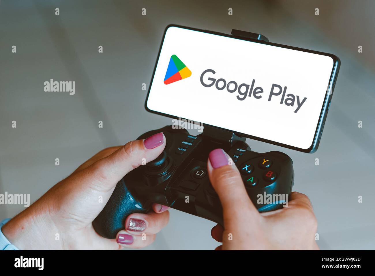 December 4, 2023, Brazil. In this photo illustration, the Google Play logo is displayed on a smartphone screen as a pers December 4, 2023, Brazil. In Stock Photo