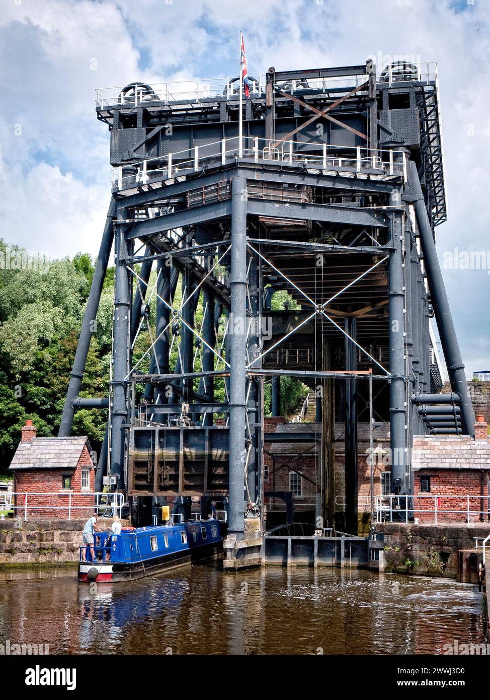 Narrowboat entering the Anderton Boat Lift, built in 1875, to go from the River Weaver up 60feet to the Trent and Mersey Canal near Anderton and North Stock Photo