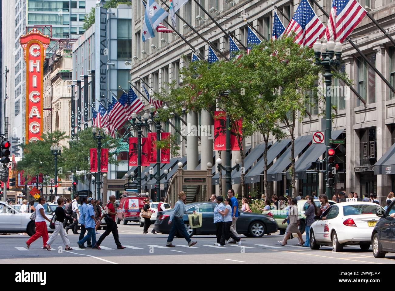 Chicago, Illinois.  State Street.  Macy's on State Street Department Store on right, formerly Marshall Field's.  Chicago Theater in Background. Stock Photo