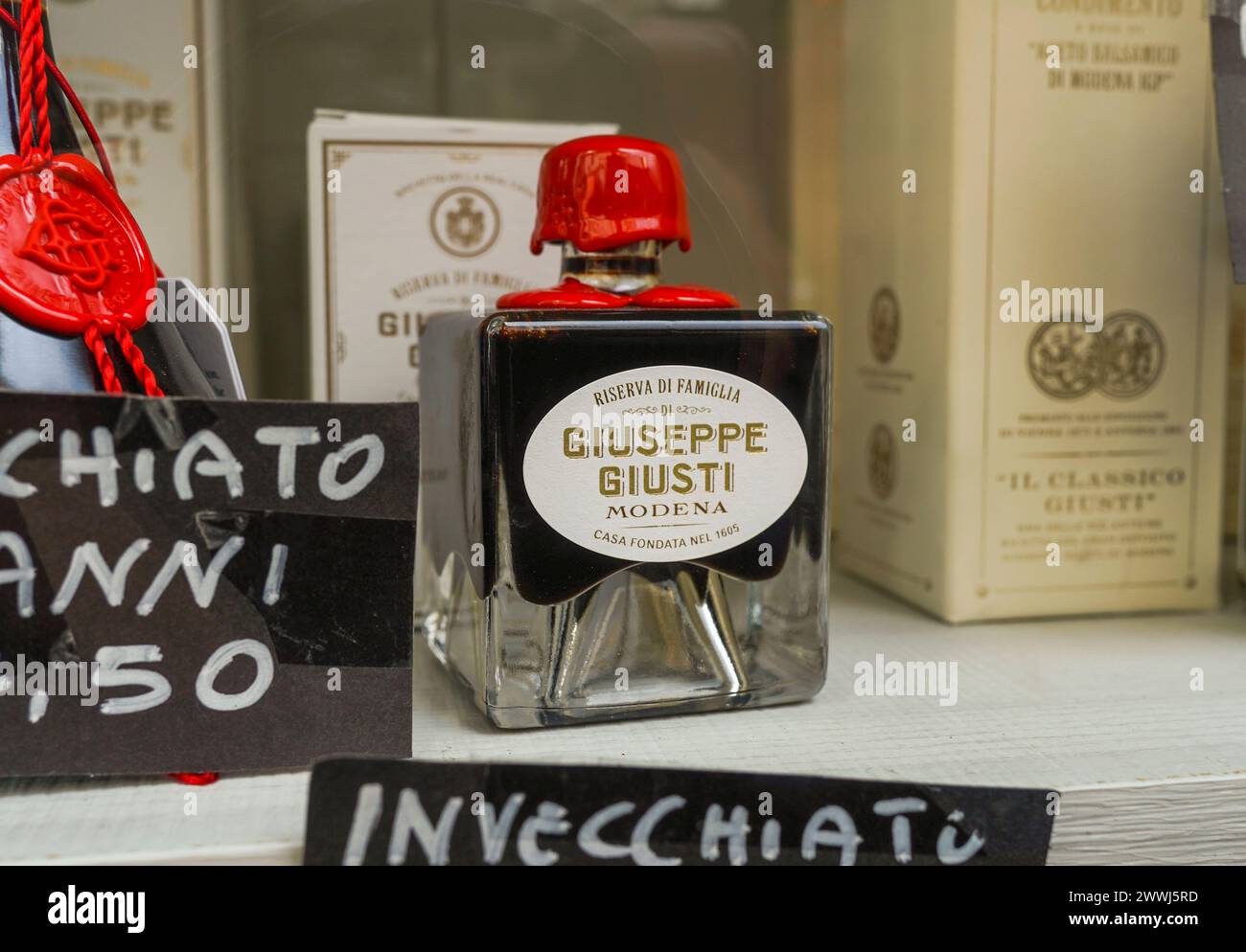 Giuseppe giusti balsamic vinegar on display in a shop window in Naples, Italy Stock Photo