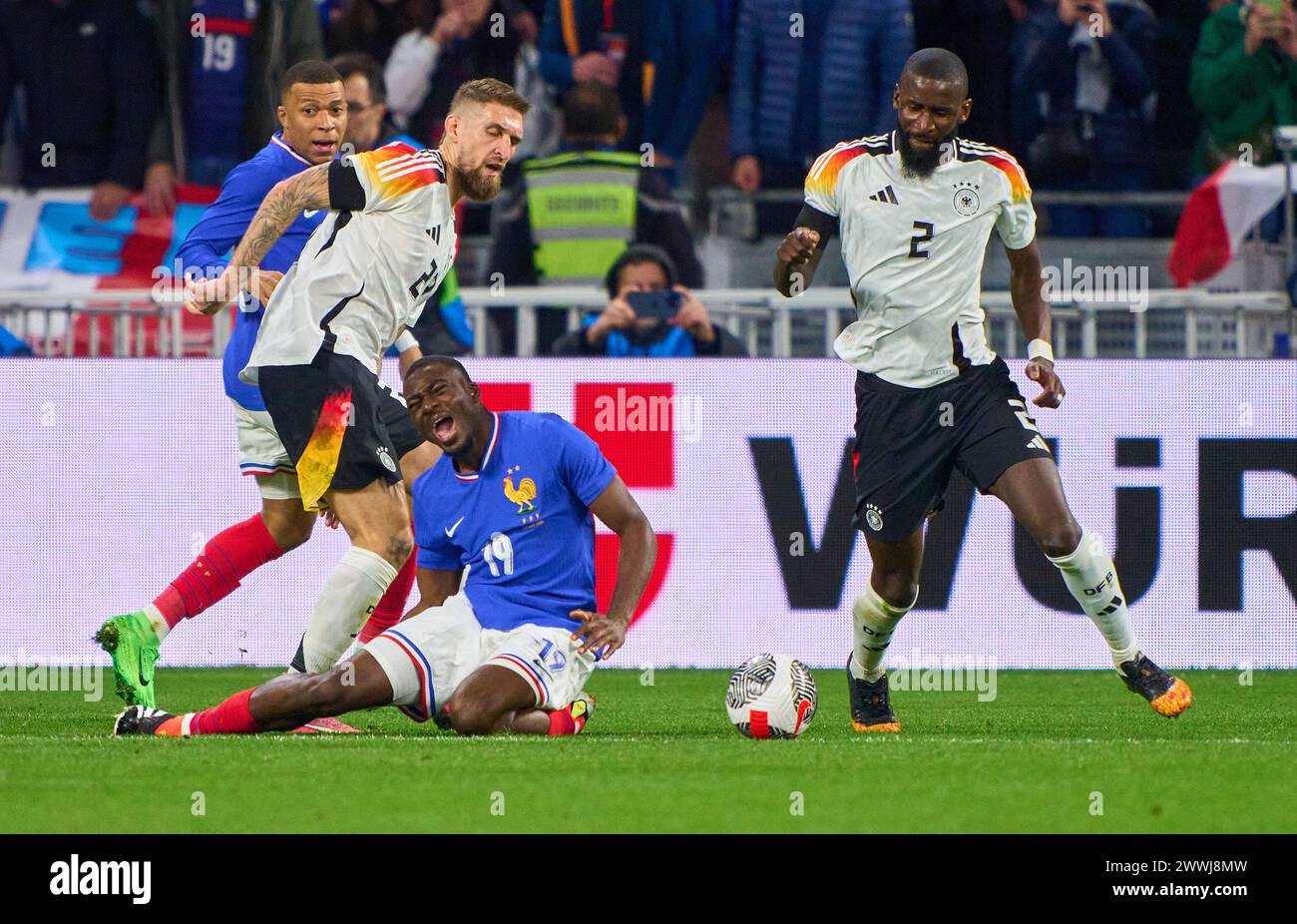 Robert Andrich, DFB 23  Antonio Rüdiger, Ruediger, DFB 2 compete for the ball, tackling, duel, header, zweikampf, action, fight against Youssouf Fofana, FRA 19  in the friendly match FRANCE - GERMANY  0-2  FRANKREICH - DEUTSCHLAND 0-2 in preparation for European Championships 2024  on Mar 23, 2024  in Lyon, France.  © Peter Schatz / Alamy Live News Stock Photo