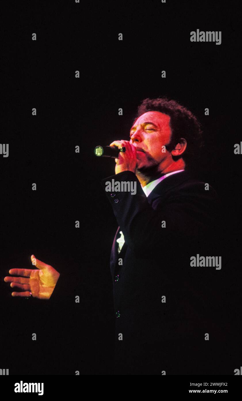 TOM JONES, HOME CONCERT, 1996: 56-year-old Welsh singing legend TOM JONES live at Cardiff International Arena CIA in Cardiff, Wales, UK on 1 December 1996. Photo: Rob Watkins. INFO: Tom Jones, born in 1940 in Wales, is a legendary Welsh singer known for his powerful voice and dynamic stage presence. With timeless hits like 'It's Not Unusual' and 'Delilah,' Jones has enjoyed a prolific career spanning multiple genres, solidifying his status as an iconic entertainer. Stock Photo