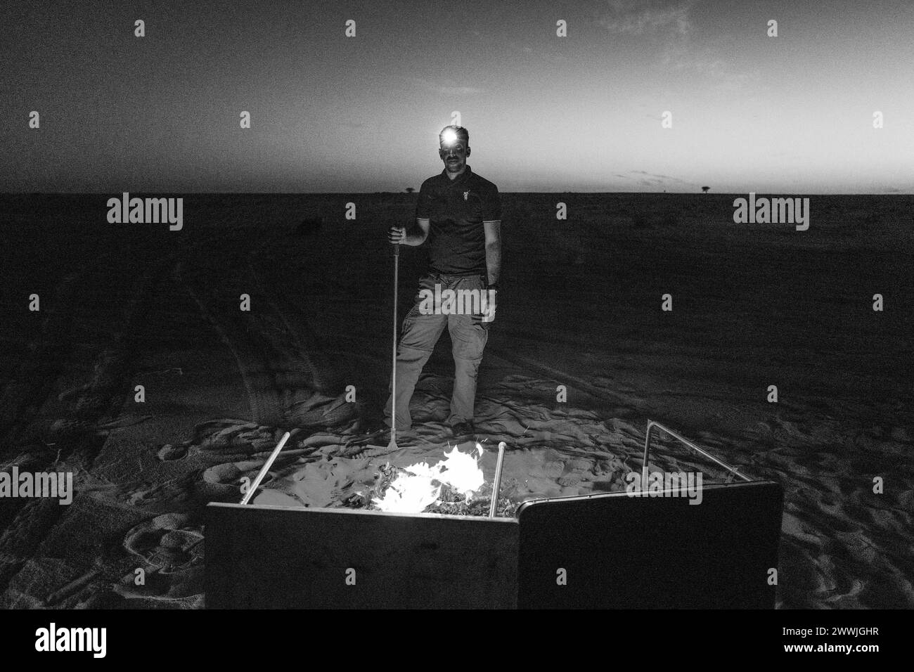 Mauritania, surroundings of Chami, traditional goat cooking in the sand