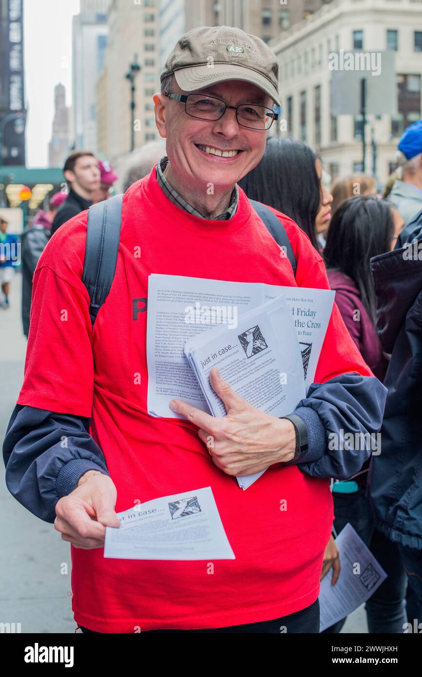 Christian ralleying the streets New York City, USA. Christian man rallying and flyering through the streets of down town Manhattan during a religious event. New York City down town, Manhattan New York United States of America Copyright: xGuidoxKoppesx Stock Photo