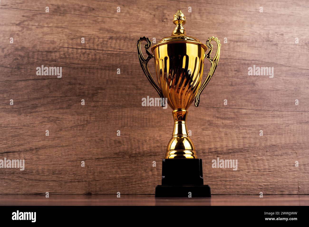 Golden trophy with copy space Stock Photo