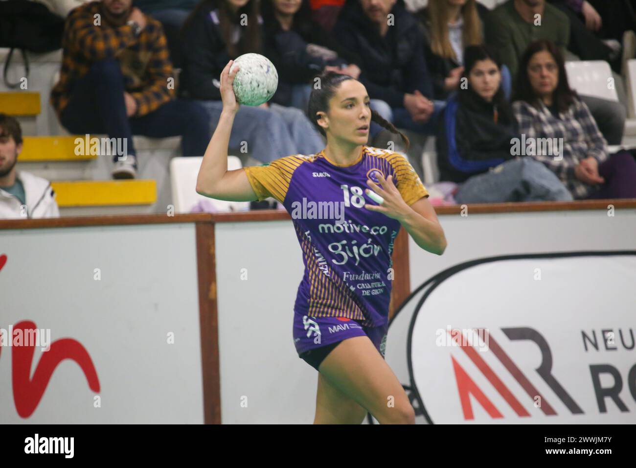 Gijón, Spain. 23rd Mar, 2024. The player of Motive.co Gijón Balonmano La Calzada, Ana Carolina Policarpo (18) with the ball during the 22nd matchday of the Liga Guerreras Iberdrola 2023-24 between Motive.co Gijón Balonmano La Calzada and the KH-7 BM. Granollers, on March 23, 2024, at the La Arena Pavilion, in Gijón, Spain. (Photo by Alberto Brevers/Pacific Press/Sipa USA) Credit: Sipa USA/Alamy Live News Stock Photo