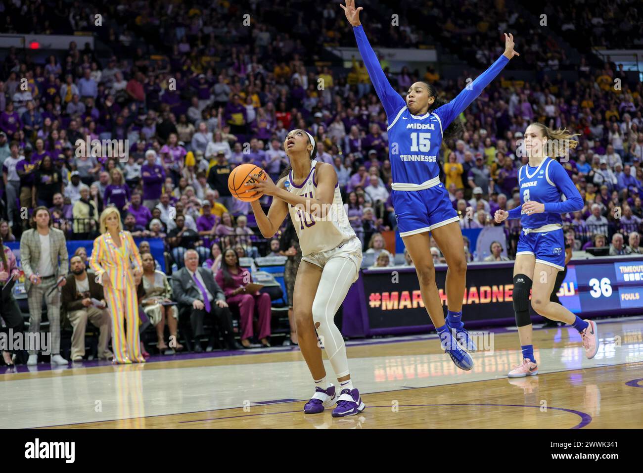 Baton Rouge, LA, USA. 24th Mar, 2024. LSU's Angel Reese (10) makes a lay up in front of Middle Tennessee's Ta'Mia Scott (15) during second round action of the NCAA Women's March Madness Tournament between the Middle Tennessee Blue Raiders and the LSU Tigers at the Pete Maravich Assembly Center in Baton Rouge, LA. Jonathan Mailhes/CSM/Alamy Live News Stock Photo